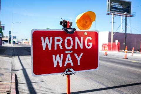 Wrong Way sign by Kenny Eliason on Unsplash