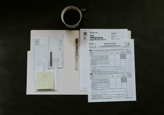 white printed paper by Kelly Sikkema courtesy of Unsplash.