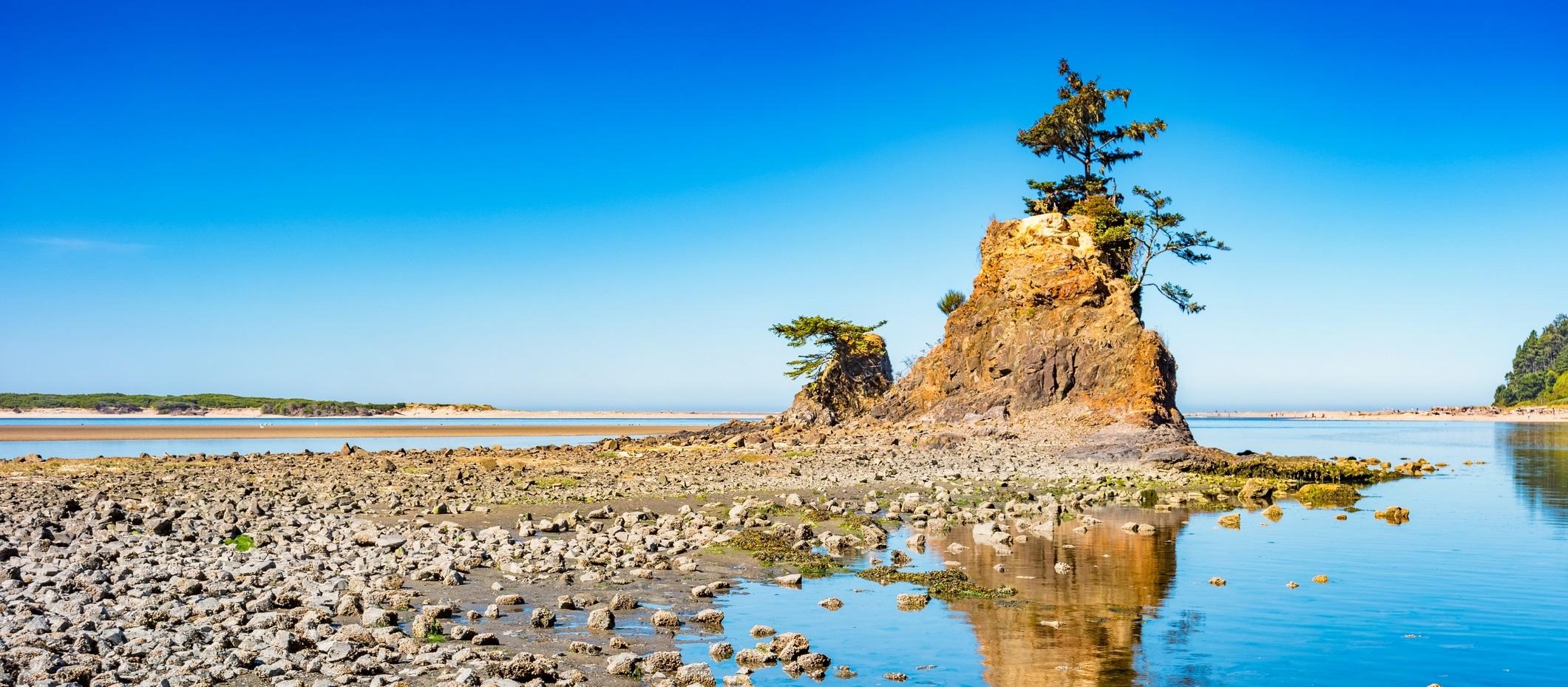 rock structure in Siletz Bay looking out towards the Pacific Ocean