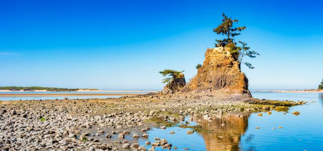 rock structure in Siletz Bay looking out towards the Pacific Ocean